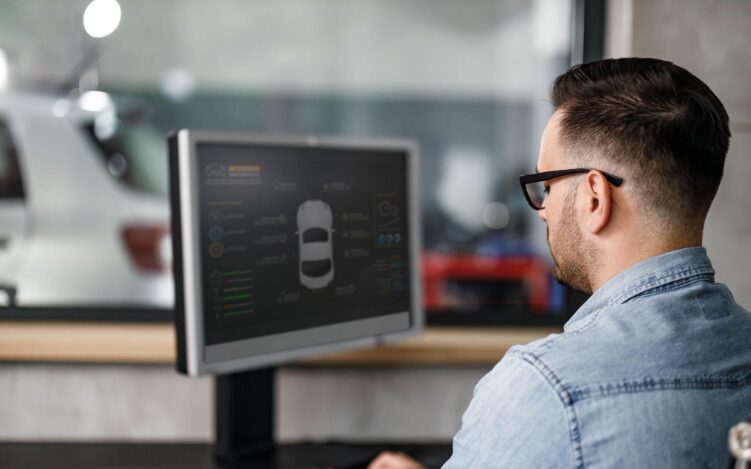 employee looking at a car system on their screen