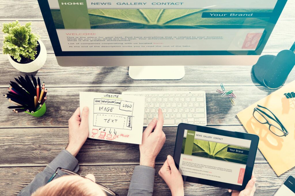 2 people working to make a website