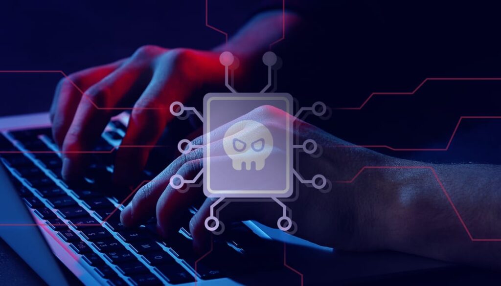 person on laptop with malware