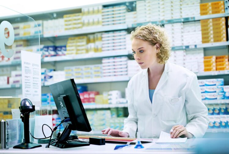 pharmacist preparing medicine