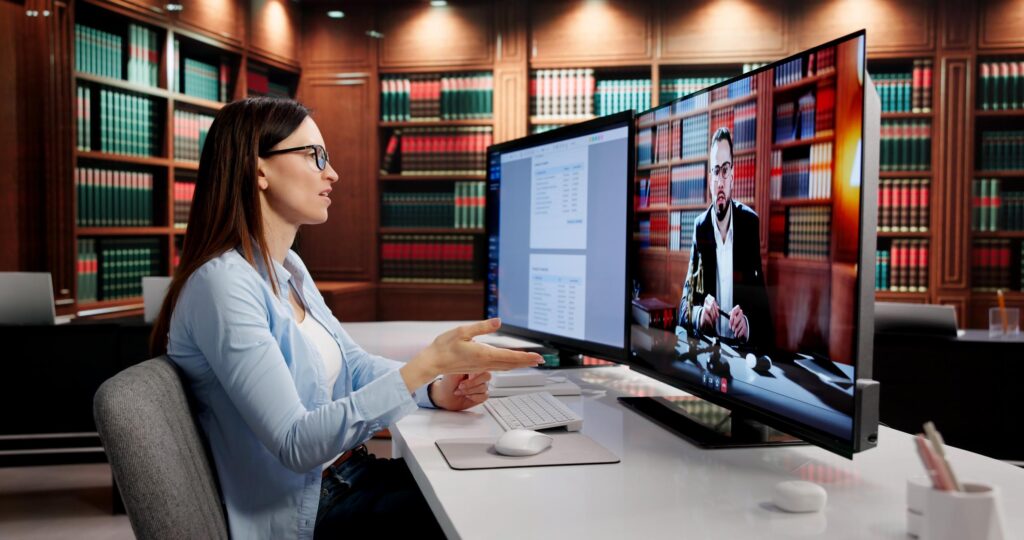 person talking to a lawyer on a video call